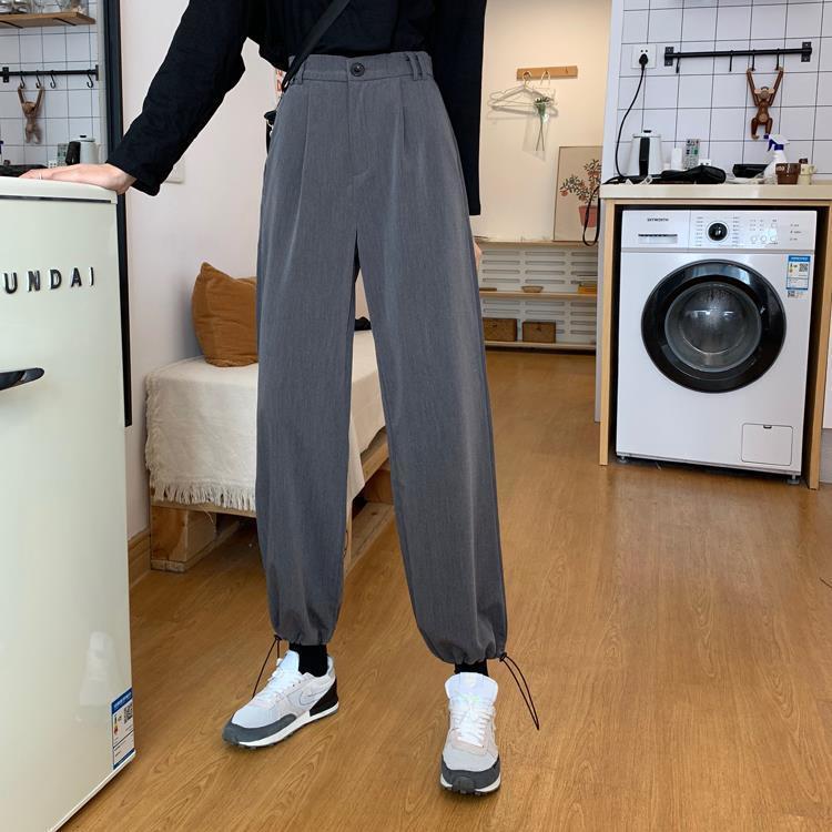 RILVA High Waist Loose Straight Leg Wide Leg Trousers in grey, styled with casual sneakers and vintage decor.
